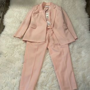 Pink Calvin Klein Blazer size 2 petite with matching suit pants size 6 petite.